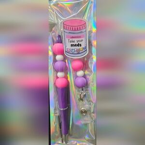 Vibrant Pink and Purple Badge Reel And Pen Set